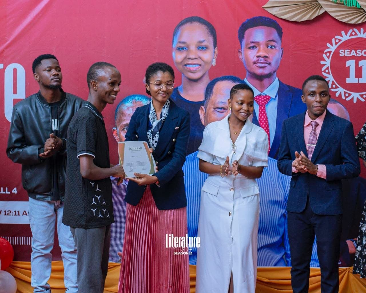 On stage at an awards ceremony