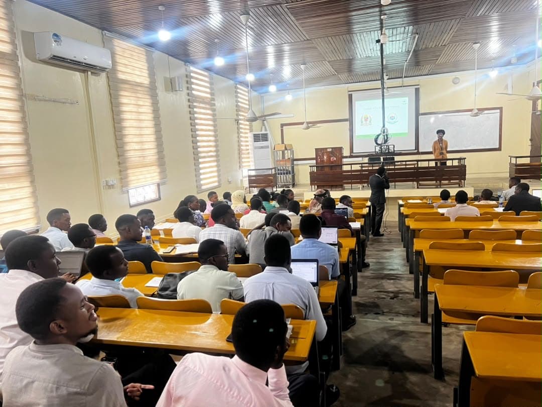 Speaking to a full lecture hall
